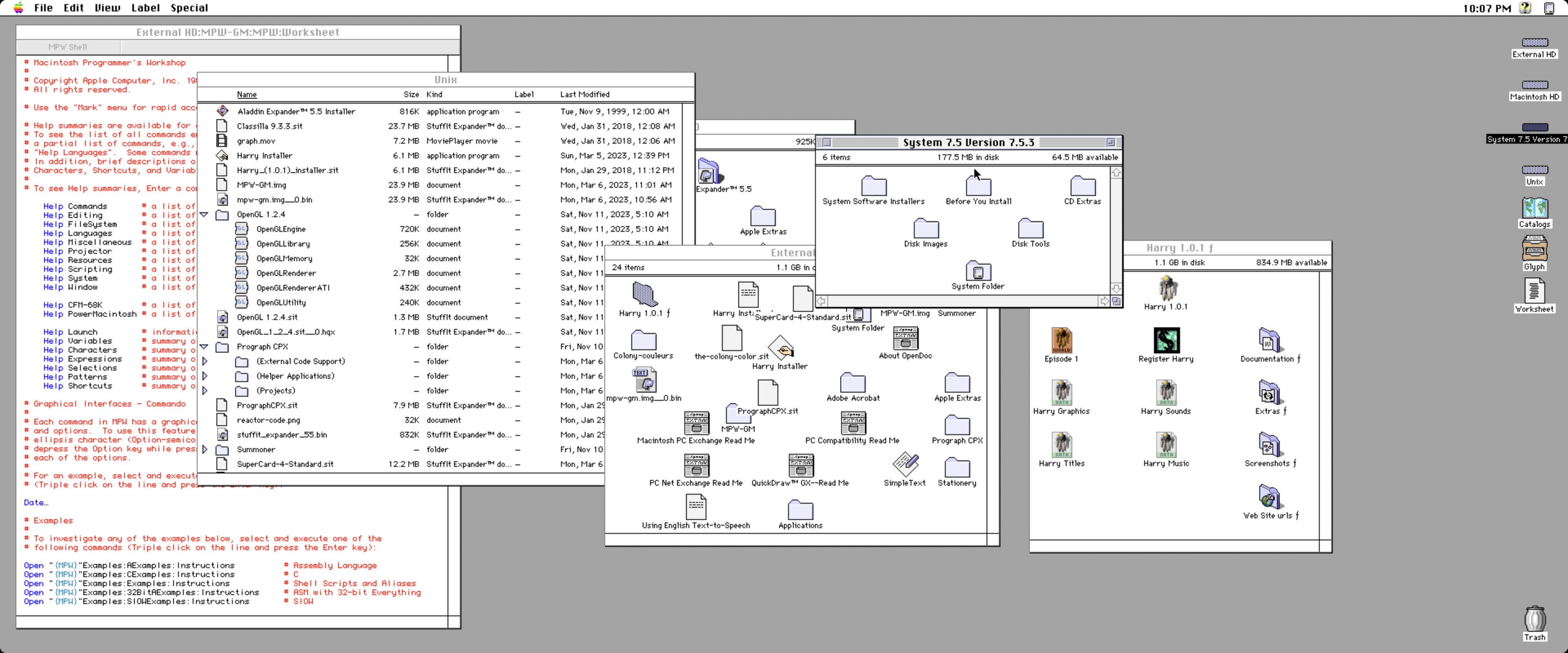 A 4k ultrawide classic MacOS desktop screenshot featuring various Finder windows and MPW Workshop